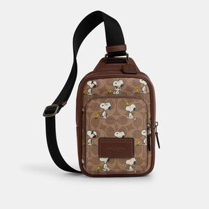NWT Coach X Peanuts Racer Sling Pack In Signature Canvas With Snoopy Print CBK47